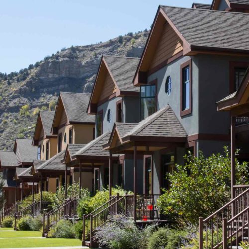 front street view of condos in mountains