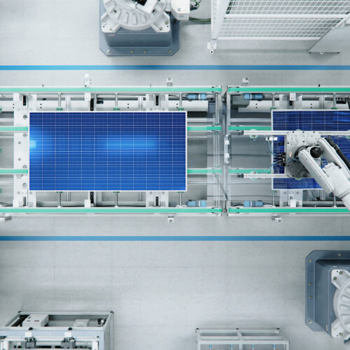 Top View of Solar Panel Assembly Line with Robot Arms at Modern Bright Factory. Solar Panel Production Prodcess at Automated Facility